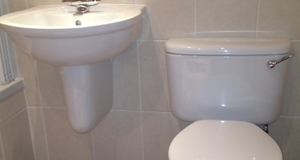 White bathroom suite, basin and toilet